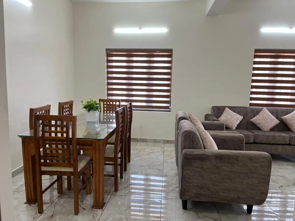 Solomon Apartments,Alappuzha Beach. Апартаменты